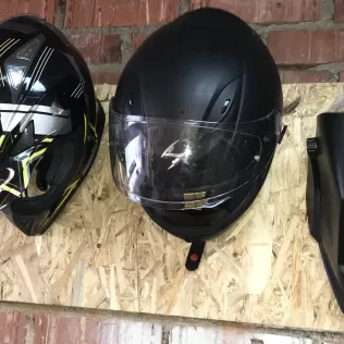 Helmet holder on wall